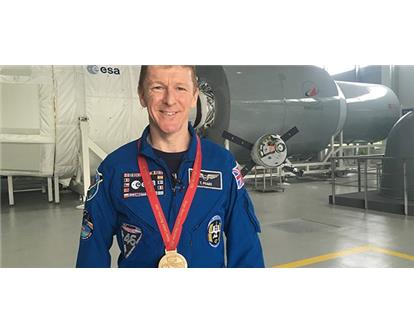 Tim Peake with medal